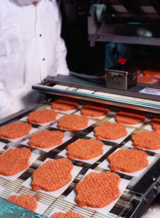 Proceso de envasado de hamburguesas para su congelación