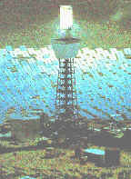 Sistema de horno solar. Se pueden observar los heliostatos iluminando el horno en su parte superior