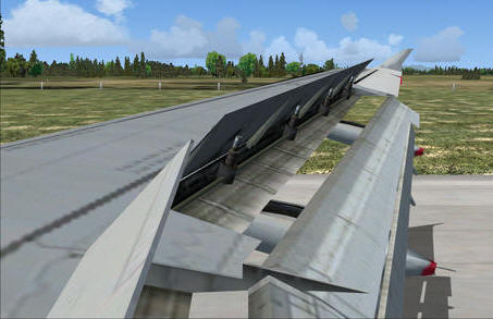 Un avión con los spoilers desplegados durante el aterrizaje